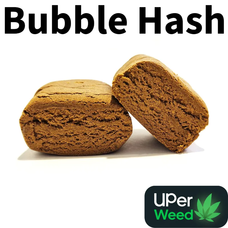 Two light tan Bubble Hash rounds with one cut open to show the interior