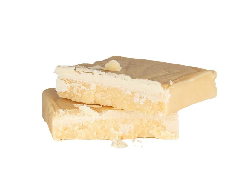 Premium Starburst Hash pale pressed slab with small rounded piece 5