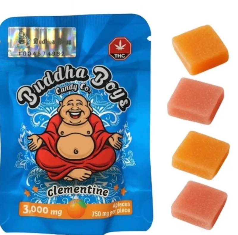 Blue Buddha Boys Clementine 3000mg pouch beside four orange and coral square gummies 1
